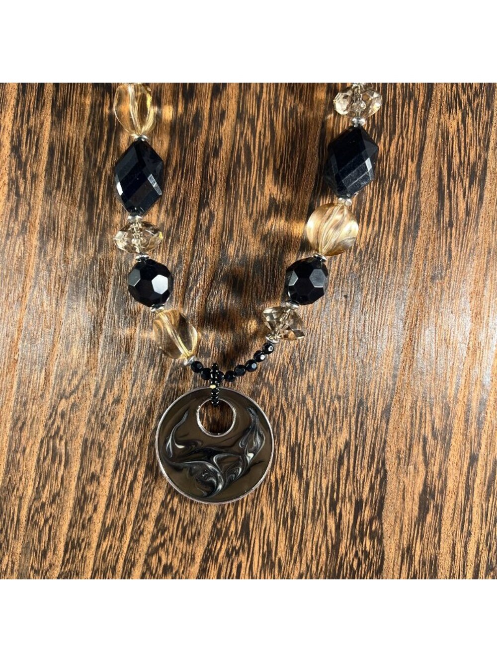 Black & Gold Beaded Necklace With Swirl Pendant & Adjustable Lobster Clasp